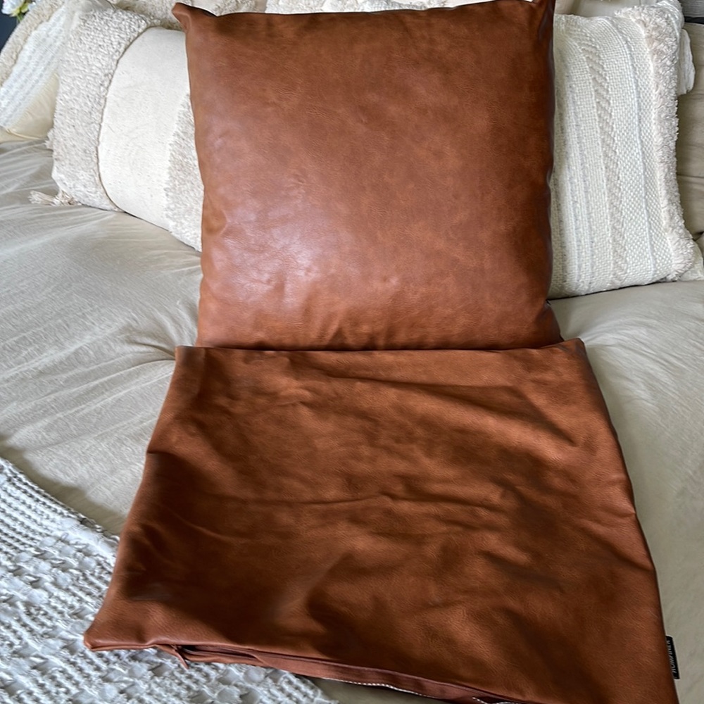 Faux leather pillow covers 18”x18”. Cognac color